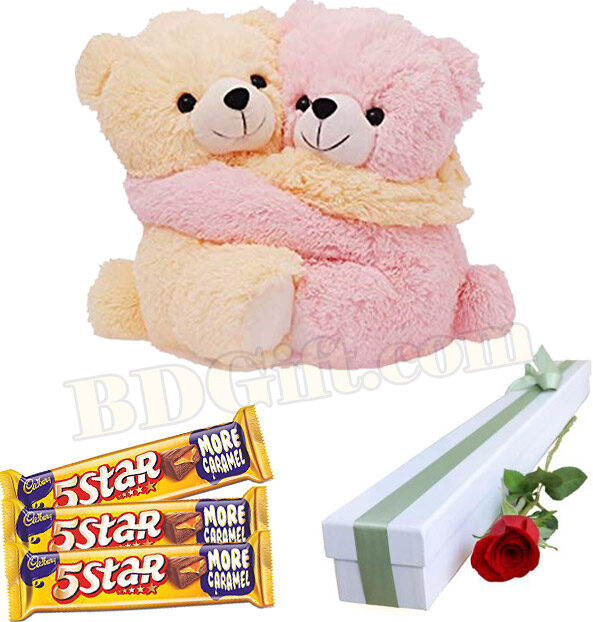 Bear with chocolate and rose