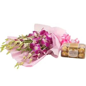 (73) Ferrero Rocher Chocolate W/ Purple Orchids in a bouquet