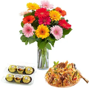 Mix Gerberas in vase with biryani and chocolates