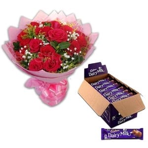 Roses with chocolate and cake
