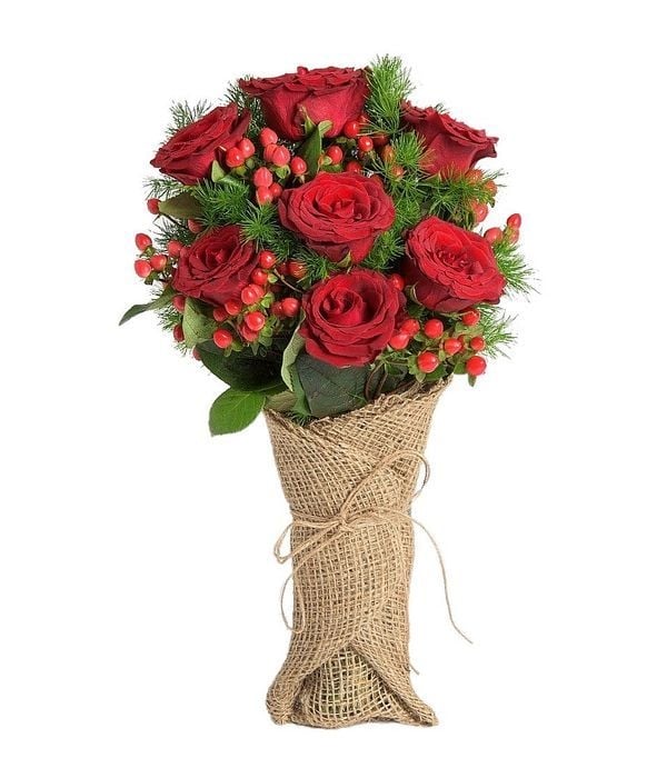 Roses and hypericum in burlap