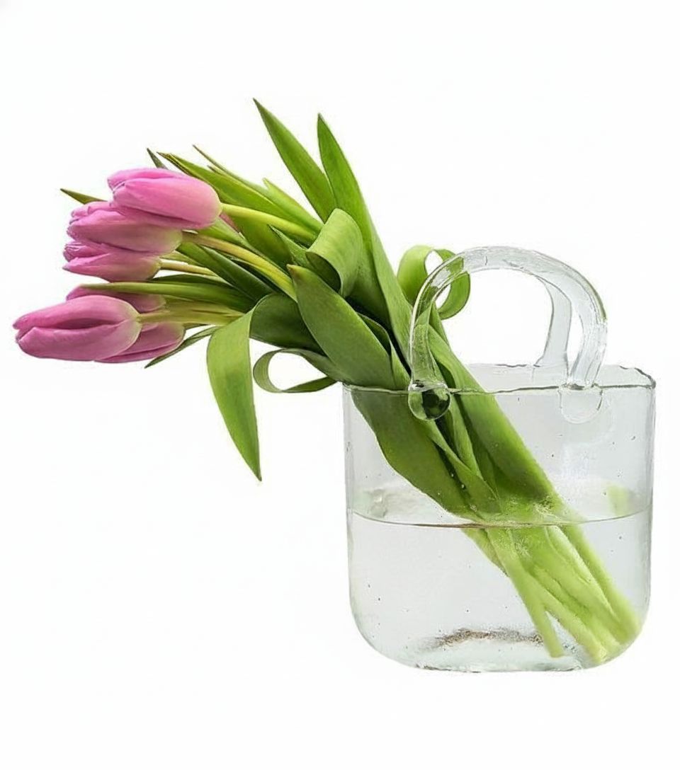 Pink tulips in a glass bag