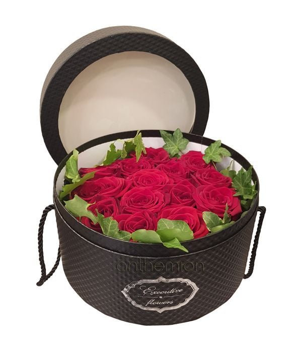 Red Roses In Round Black Box