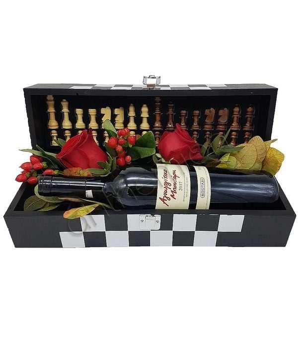 Chess board with flowers and wine