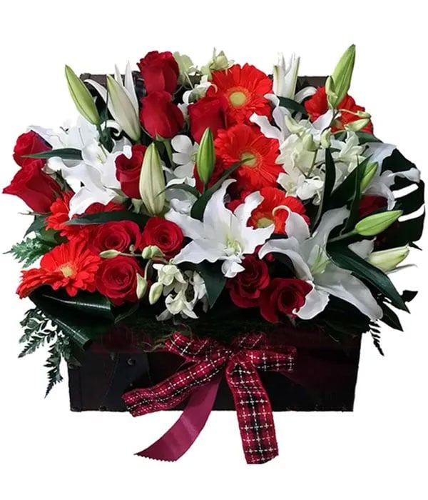 Red, white and orange flowers in wooden chest (Basic)