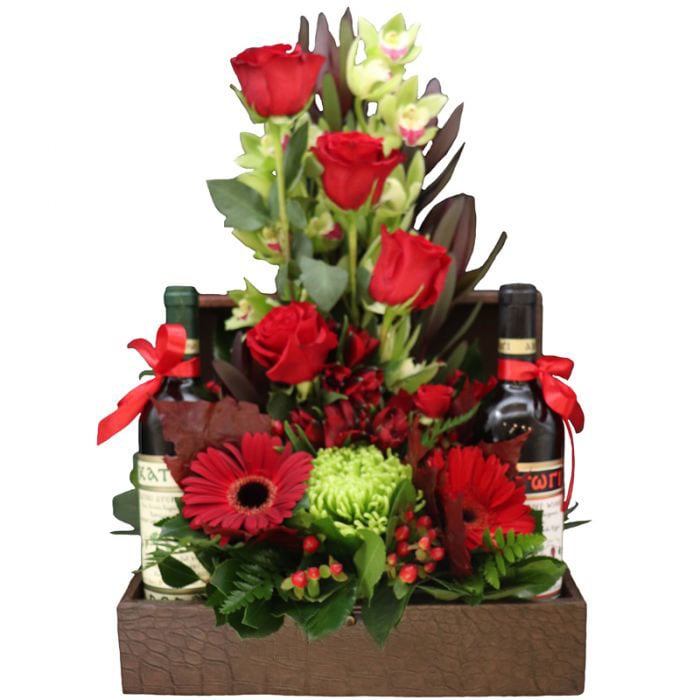 Leather Chest With One Bottles Of Wine And Flowers