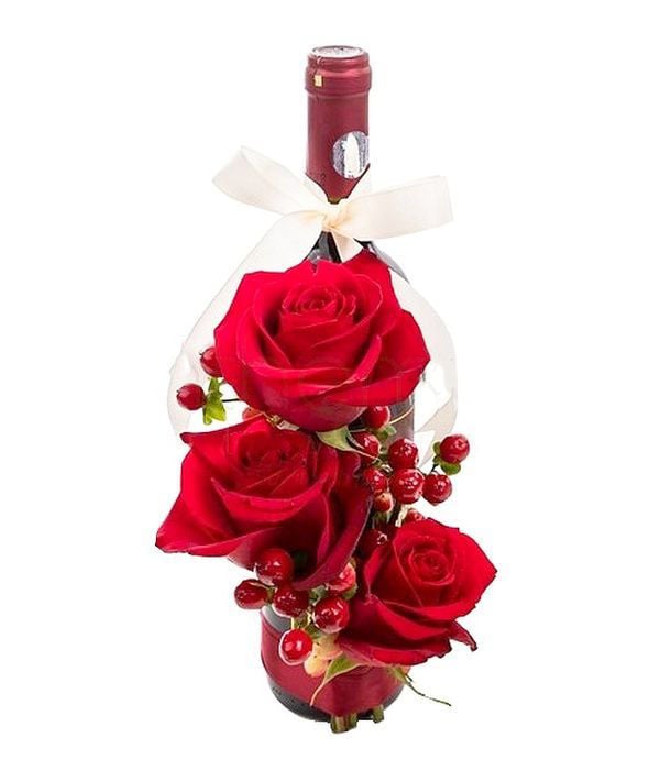 Love roses with a bottle of wine