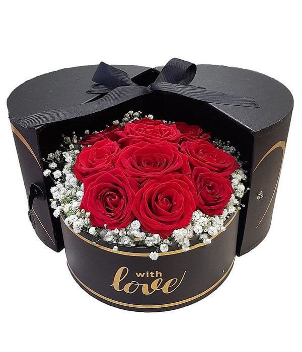 Red roses in box with love