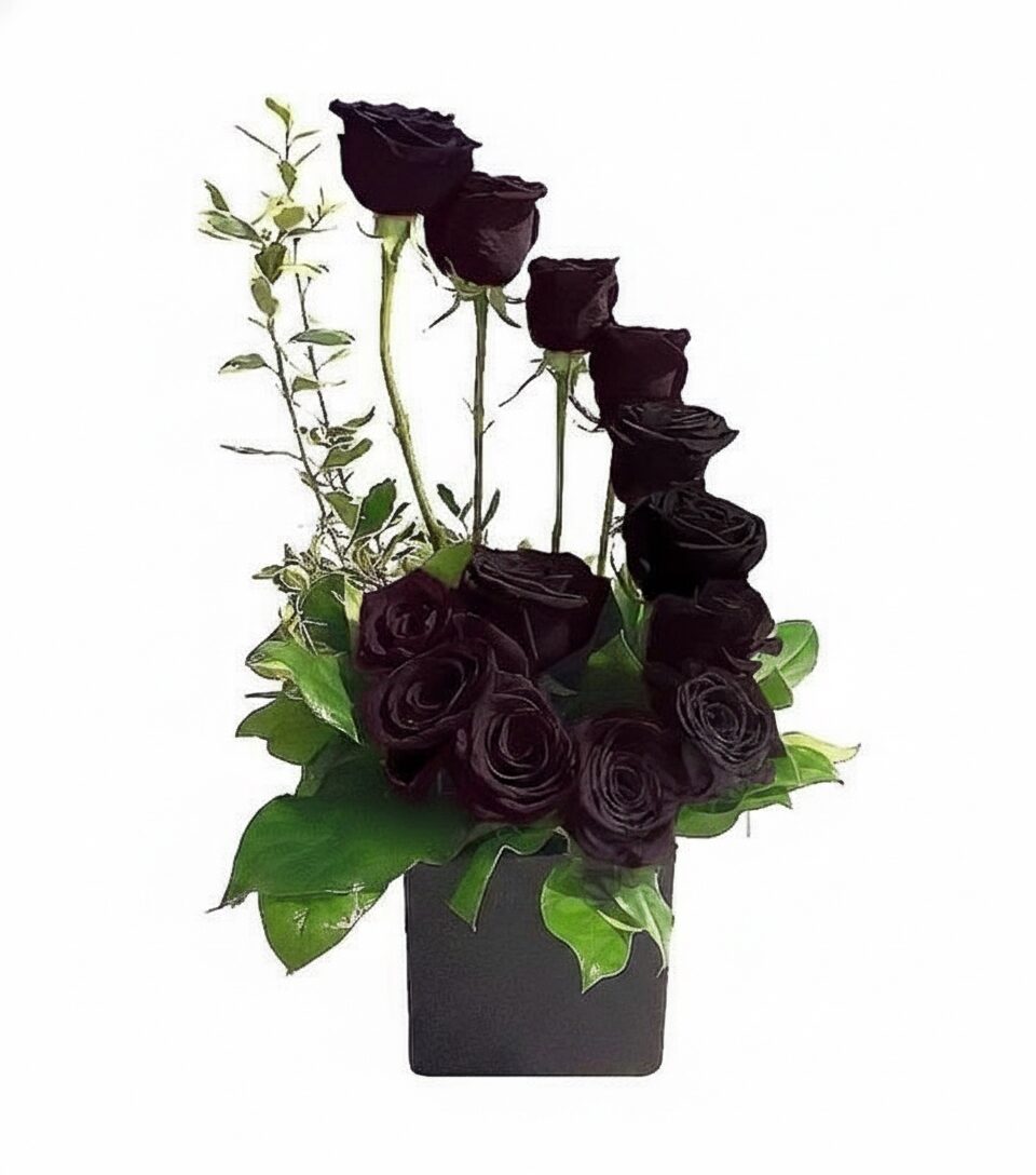 Tall arrangement with black roses