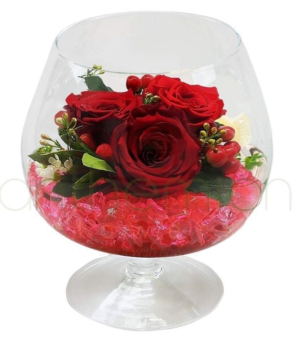 Roses in a cognac glass