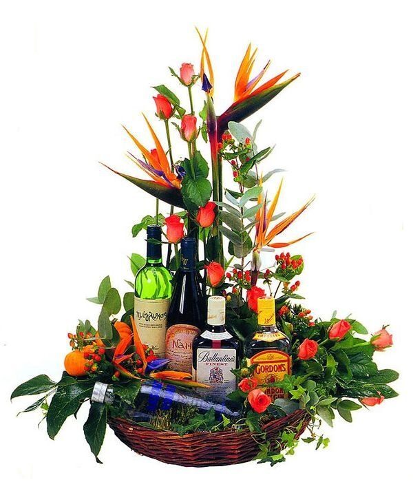 Arrangement of flowers and 5 different drinks