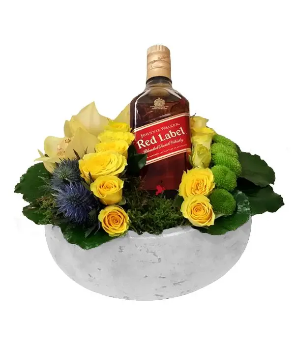 Yellow and green flowers paired with Johnnie Walker