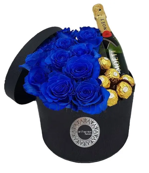 Blue roses in a box and a MOET