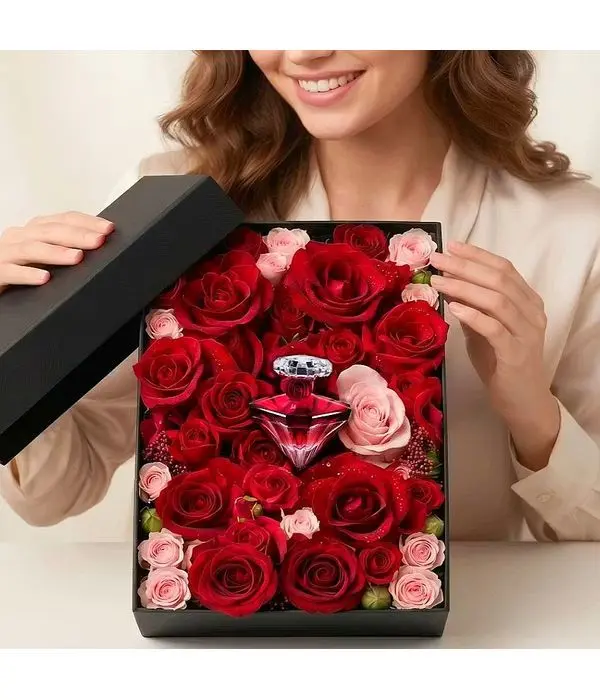 Box with roses and La Nuit Trésor Rouge Drama perfume
