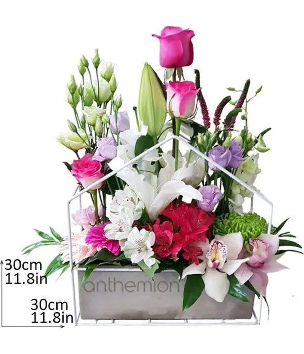 Floral arrangement in ceramic base
