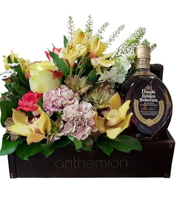 Flower arrangement with DIMPLE whiskey