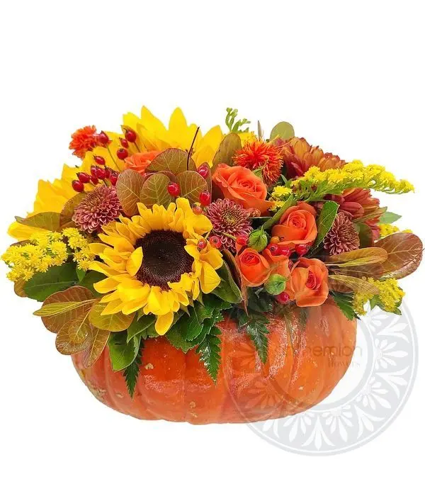 Arrangement with natural pumpkin and flowers