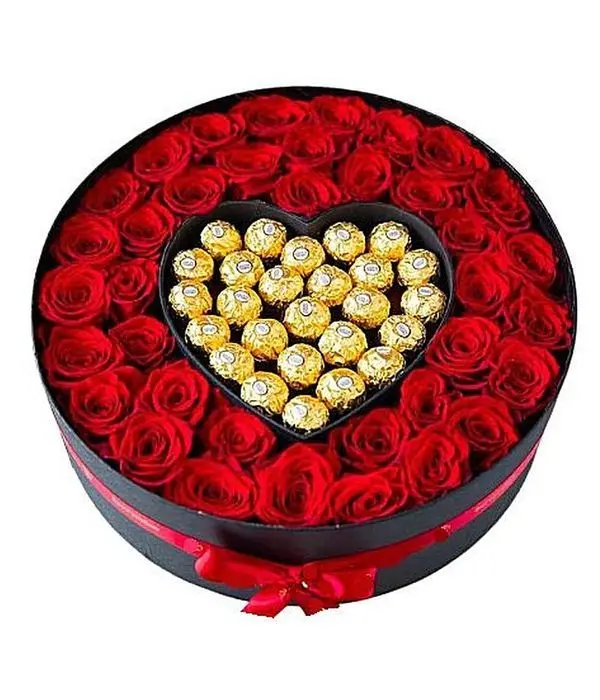 Sweetheart's rose arrangement with Ferrero