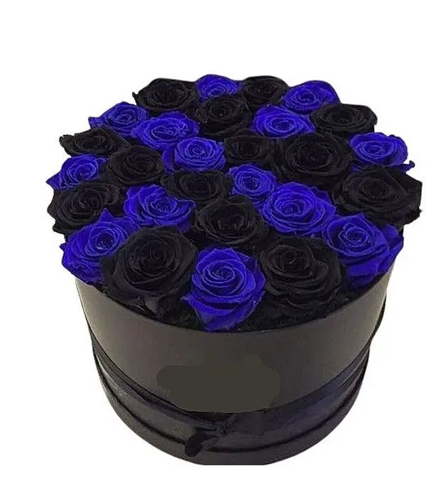 Dreamy arrangement in black box with black and blue roses