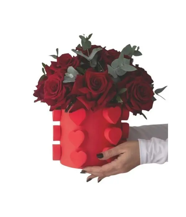 Classic red roses in a red box with hearts!