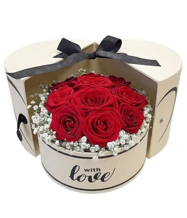 Red roses in box with love
