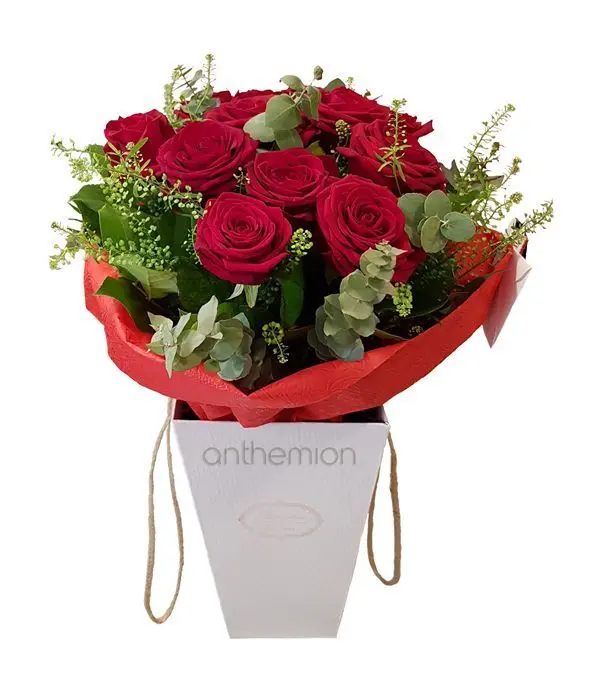 Red roses in gift bag