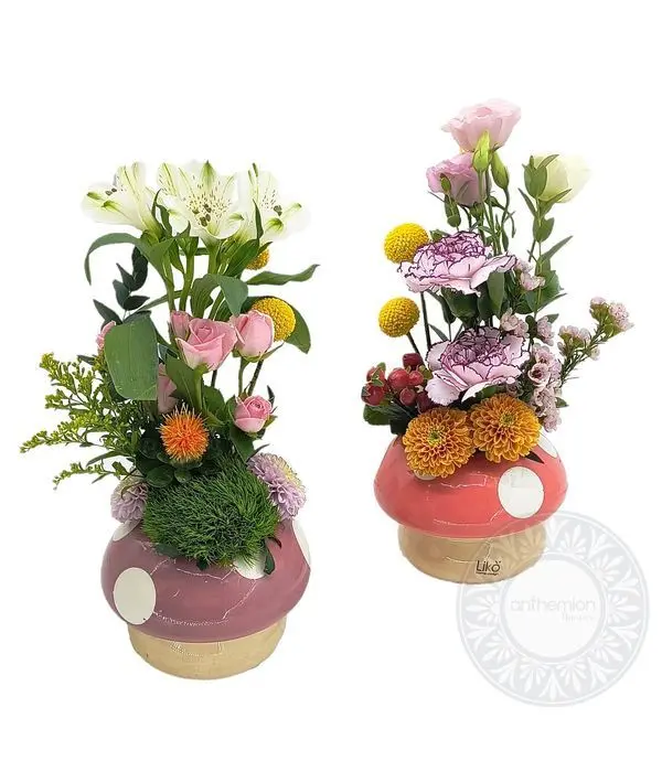 Set of 2 ceramic mushrooms with seasonal flowers!