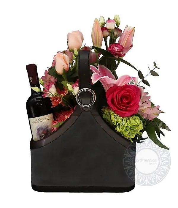 Brown newspaper case with drink and flowers (choice of drink)
