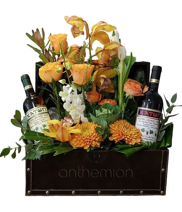 Leather chest with wines and bright flowers