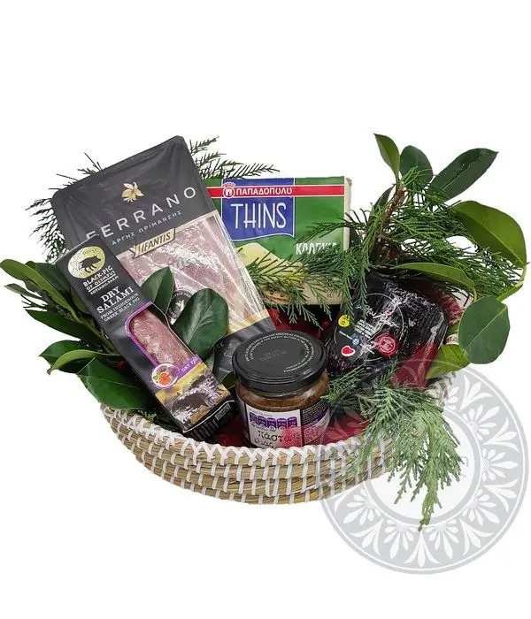 Round wicker tray with gourmet salty snacks