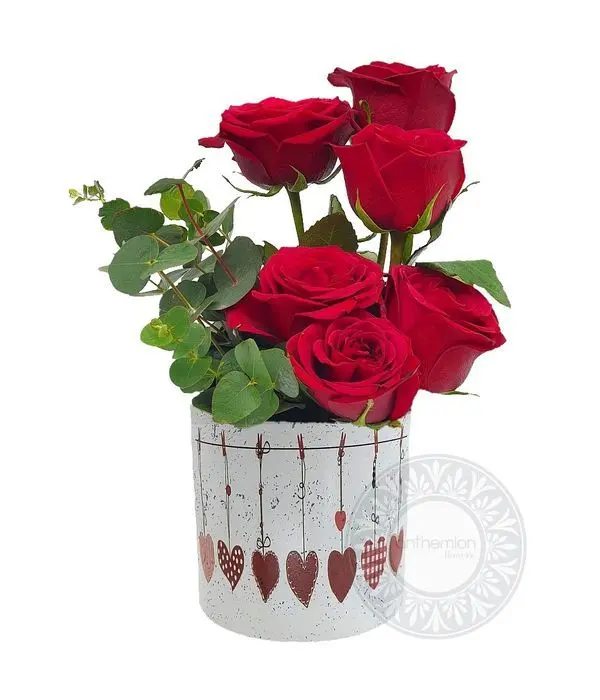 White ceramic with hearts and roses