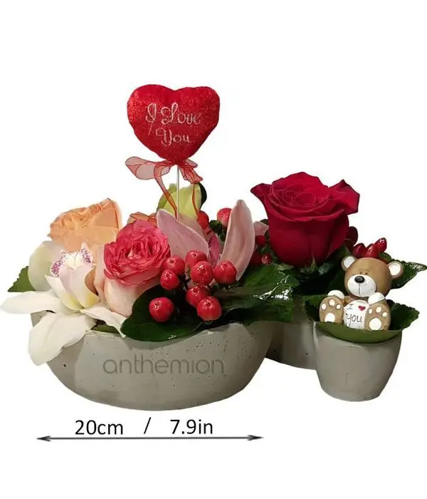 Triple base with flowers and teddy bear