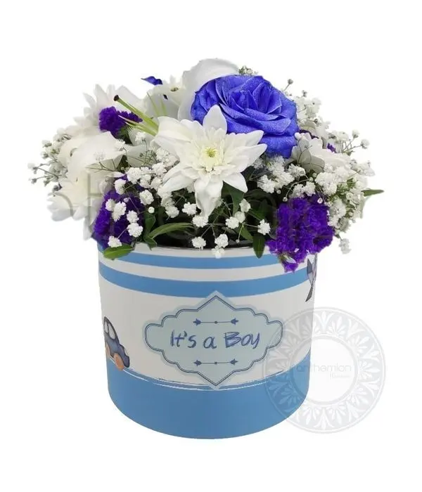 Hat box with white and blue flowers