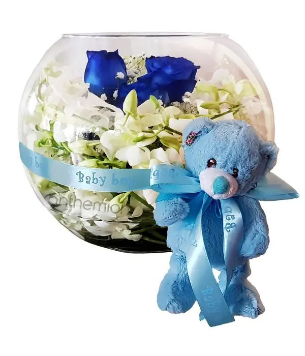 Fish ball with orchids, roses and a teddy bear