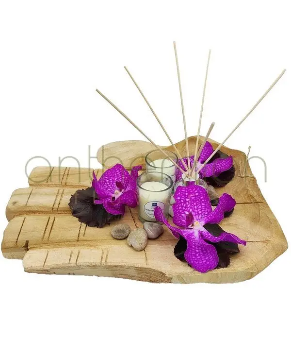 Decorative centerpiece with orchids and candles