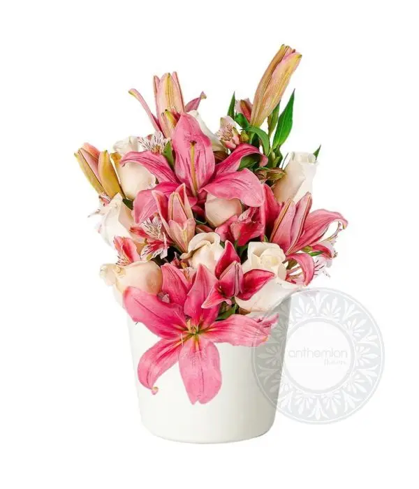 Pink flower arrangement in pot (Basic)