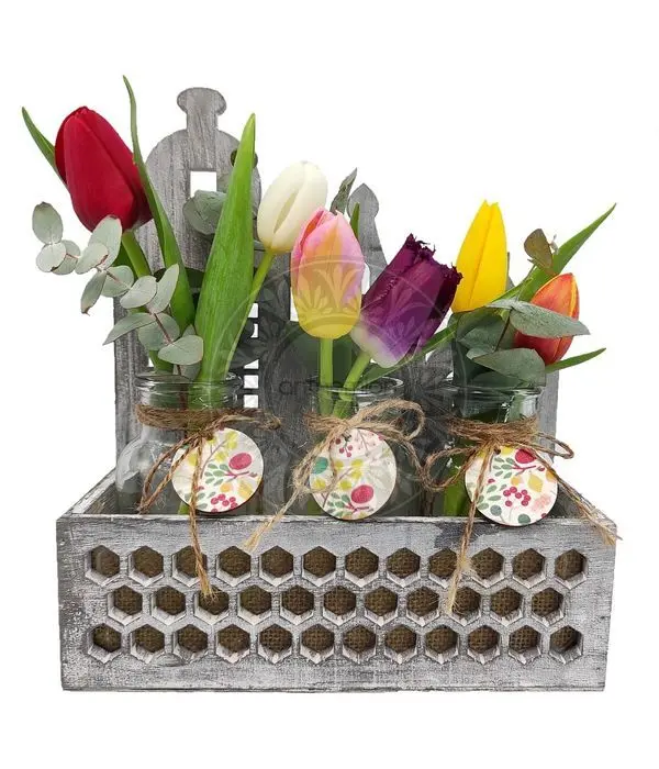 Colorful tulips in wooden arrangement