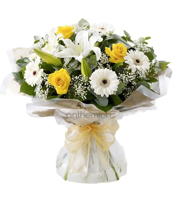 Yellow roses with white lilies and gerberas