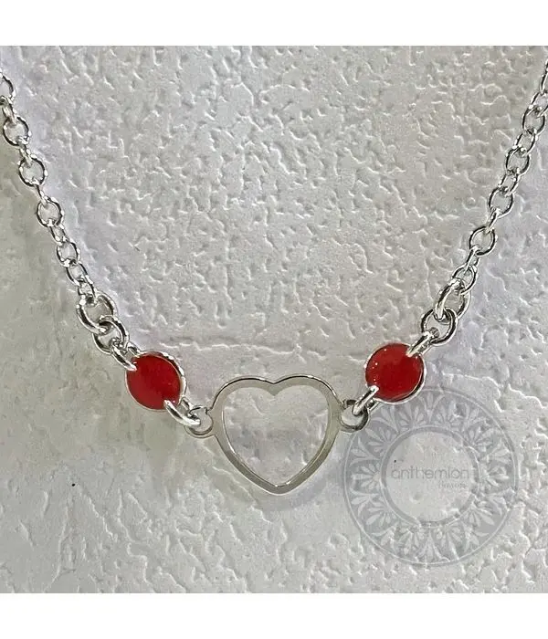 Heart jewelry with red stones
