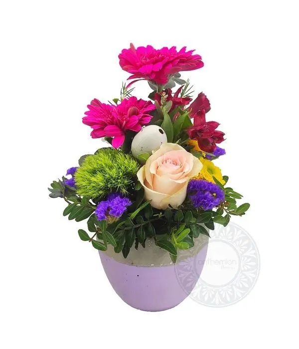 Ceramic egg with flowers in bright colors