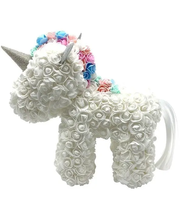 White unicorn of foam roses and lights