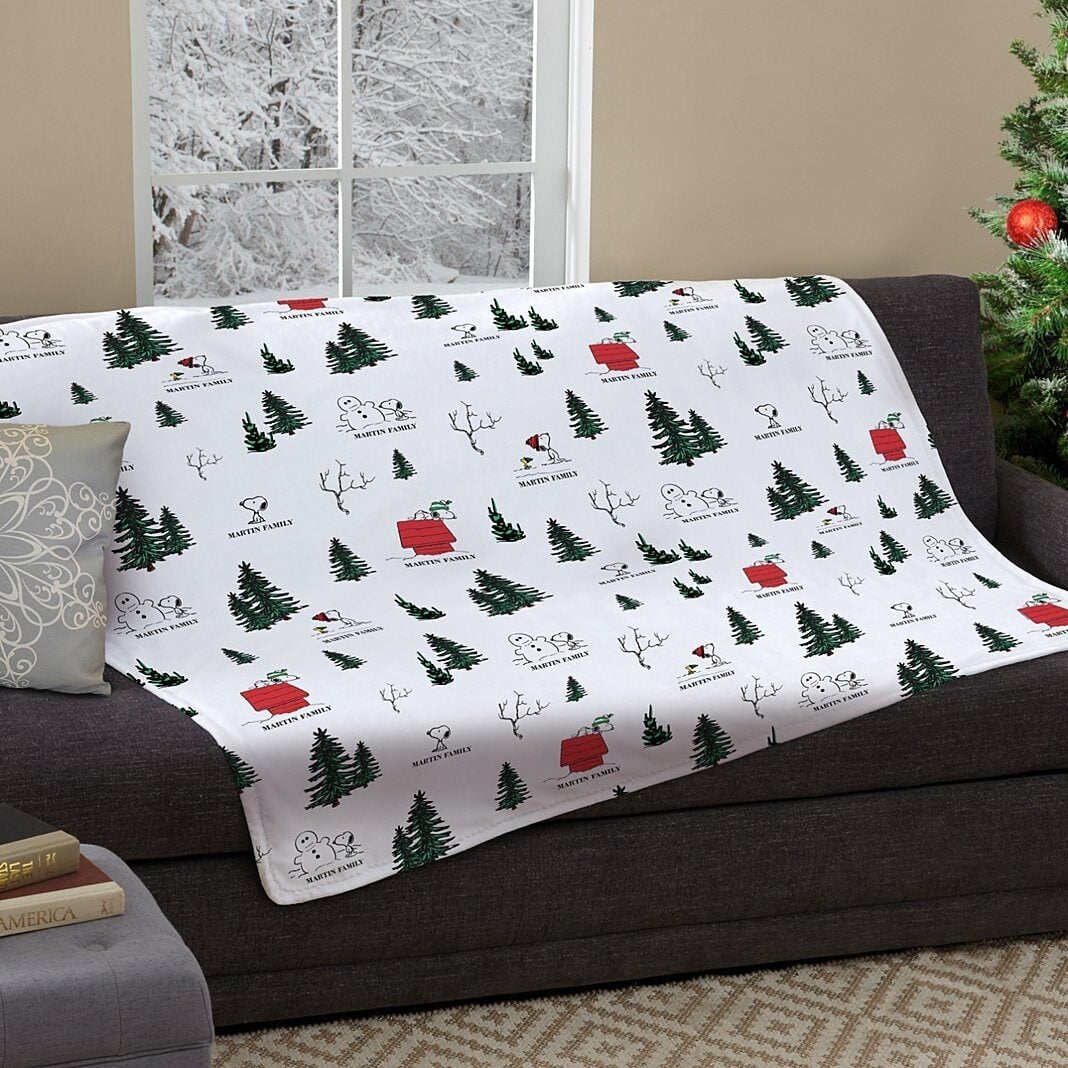 PEANUTS® Winter Snoopy All Over Pattern Plush Blanket