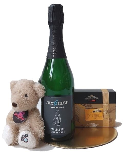 Sparkling Wine, Chocolates And A Bear