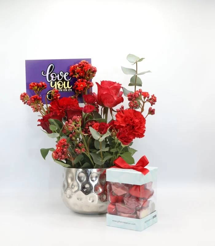 Assorted Chocolates and Red Elegance