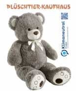 gray teddy bear with bow