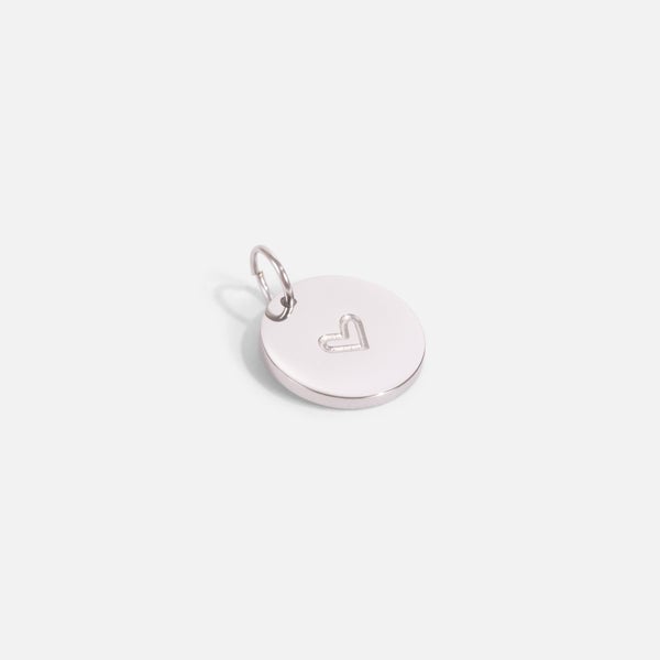 Small silvered charm with heart
