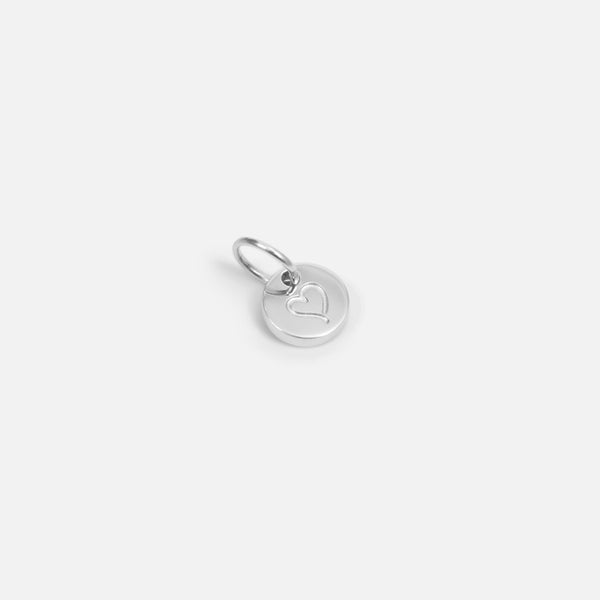 Small symbolic silvered charm engraved "heart"