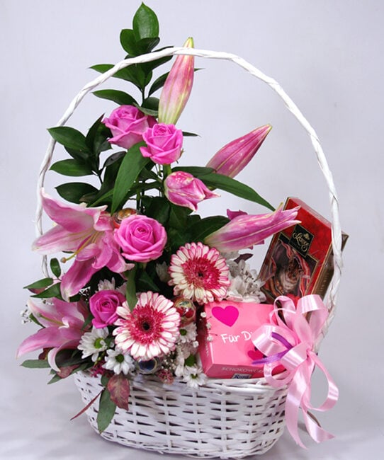 Sweet flower basket with lilies and roses