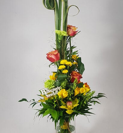 Graduation bouquet with roses and orchids