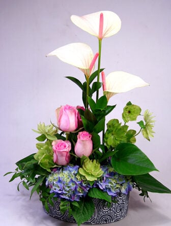 White flamingos and roses